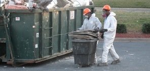 Removing Moldy Debris From Water Damage Site