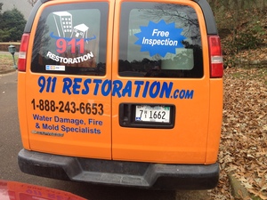 Water Damage Monument Rear Of Van At Residential Job