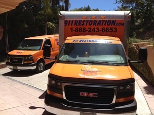 Water Damage Restoration Truck At Residential Job Location